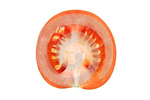 Half of a cut tomato on a white isolated background, close-up