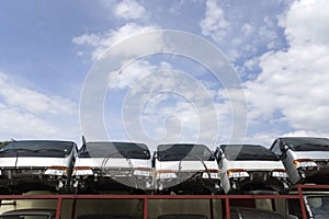 Half cut trucks in junkyard