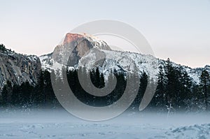 Half dome illuminated by the setting sun