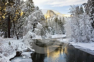 Half Dome over a frozen Merced River photo