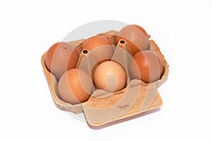 Half a dozen organic eggs in cardboard box