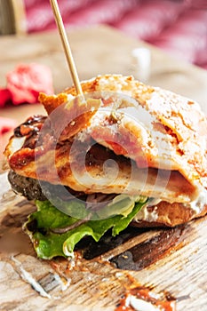 Half eaten burger on table