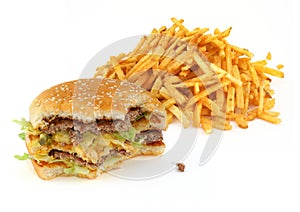 Half-eaten hamburger and french fries