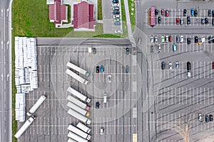 Half empty parking lot near shopping center. aerial view