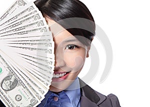 Half face of a business woman and money