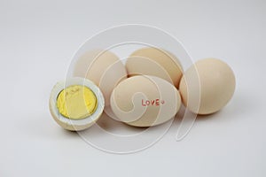 Half and four boiled Eggs with love character