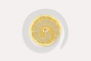 Half a fresh lemon on a white background.