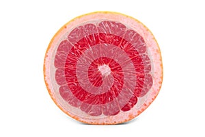 Half of fresh pink grapefruit full of vitamins, isolated on a white background. Juicy, ripe, organic, fresh, exotic citrus fruits.