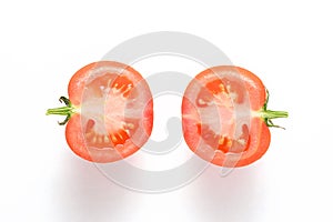 Half fresh tomato isolated on white background. Top view