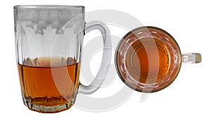 Half full glass of tea soda or cola beverage, side and top view