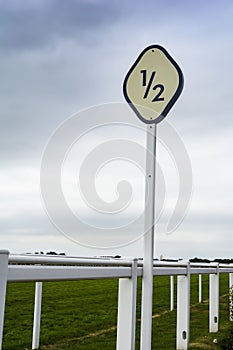 Half furlong marker at horse racing venue