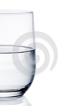 Half glass of pure water with space for text