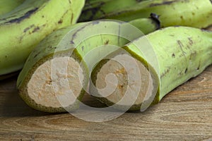 Half green unripe bananas