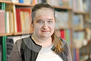 Half growth portrait of student with hair gathered