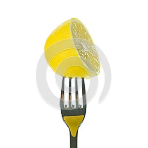 Half lemon on fork