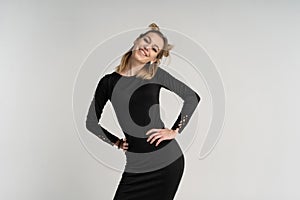 Half lengh portrait of young pretty girl hipster in black dress
