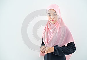 Half length portrait of asian beautiful Muslim young woman wearing business attire and hijab with mixed poses and gestures isolate