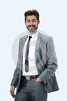 Half length portrait of a businessman with hands in his pockets