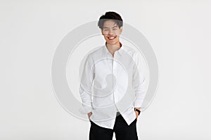 Half length shot portrait of a handsome good looking tomboy, a girl who loves to be a man, on white background