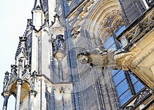 half-man half-monster gargoyle statue in a church photo
