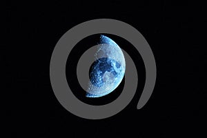 Half  moon  on black background. Close up Image. Bright lunar satellite