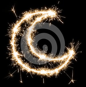 A half Moon on a black background is drawn with sparklers, an imitation of a long exposure