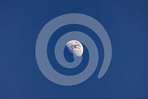 Half moon blue sky