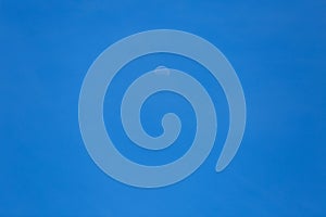 Half moon on blue sky and clouds