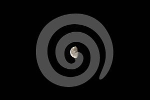 Half moon on the dark night sky