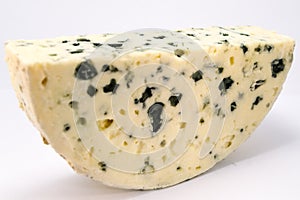 Half moon of Roquefort cheese from France