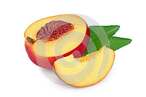 Half nectarine fruit with leaf isolated on white background cutout