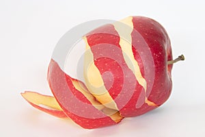 Half peeled red apple