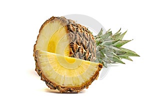 Half pineapple with slice on white background