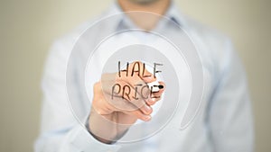 Half Price , man writing on transparent wall
