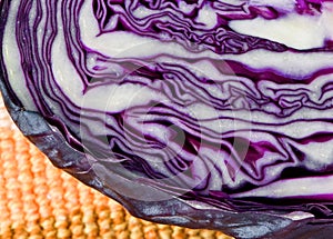 Half purple cabbage on yellow placemat