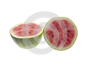 Half of red juicy watermelon rotated isolated on white background