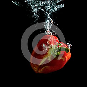 Half red pepper in water