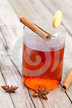 Half red tea with cinnamon sticks