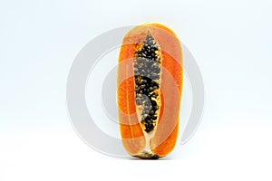 Half of ripe papaya fruit with seeds isolated on white background with copy space. Natural source of vitamin C, folate and