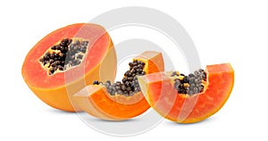 Half  ripe papaya fruit with seeds  on white background