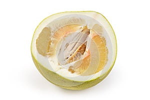 Half of ripe pomelo on a white background