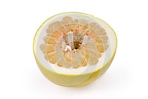 Half of ripe pomelo on a white background