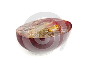 Half of ripe sweet grape on white background