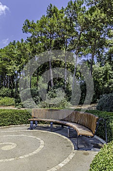 Half round bench in the park vertical