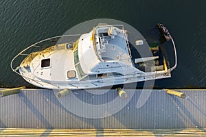 Half sunken sailing yacht capsized on shallow bay waters after hurricane Ian in Manasota, Florida