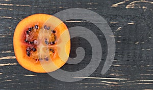 Half tamarillo fruit