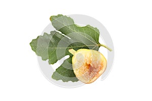 Half of tasty green fig with leaf isolated, top view