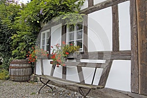 Half-Timbered House With Bench