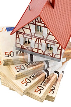 Half-timbered house on euro banknotes