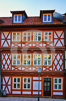 Half-timbered house with small wooden windows in the old town of Wernigerode. Saxony-Anhalt, Germany